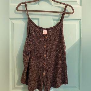 Two tank tops. 3x fit like 1x